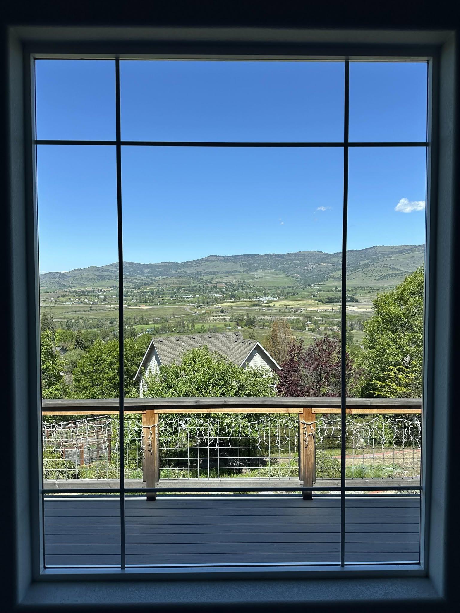 A freshly cleaned window with a clear view over the valley